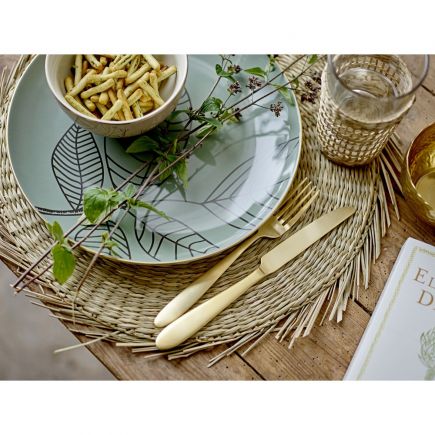 Plato, cubiertos y vaso sobre Mantel Individual Redondo Heming