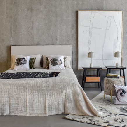 Gray upholstered headboard with 'Riga' edging | Procomobel
